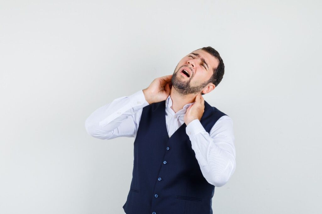 Person cracking their neck to relieve stiffness and tension