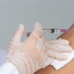 Healthcare professional administering a lipotropic injection