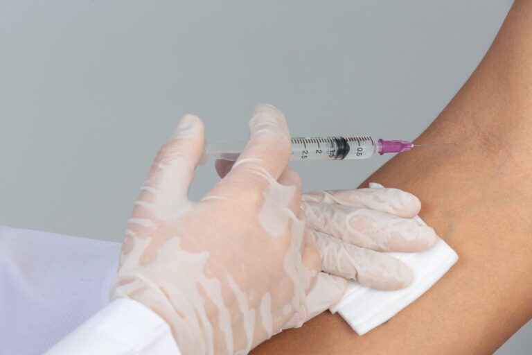 Healthcare professional administering a lipotropic injection